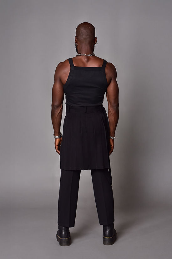 Pantalon loose fit falda plisada negro